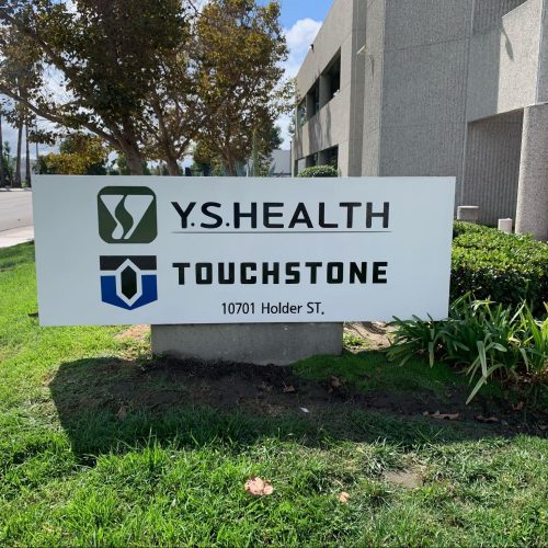 a monument sign for Y.S. Health and Touchstone.